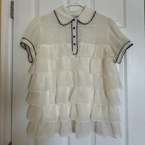 Flouncy sheer white and black top